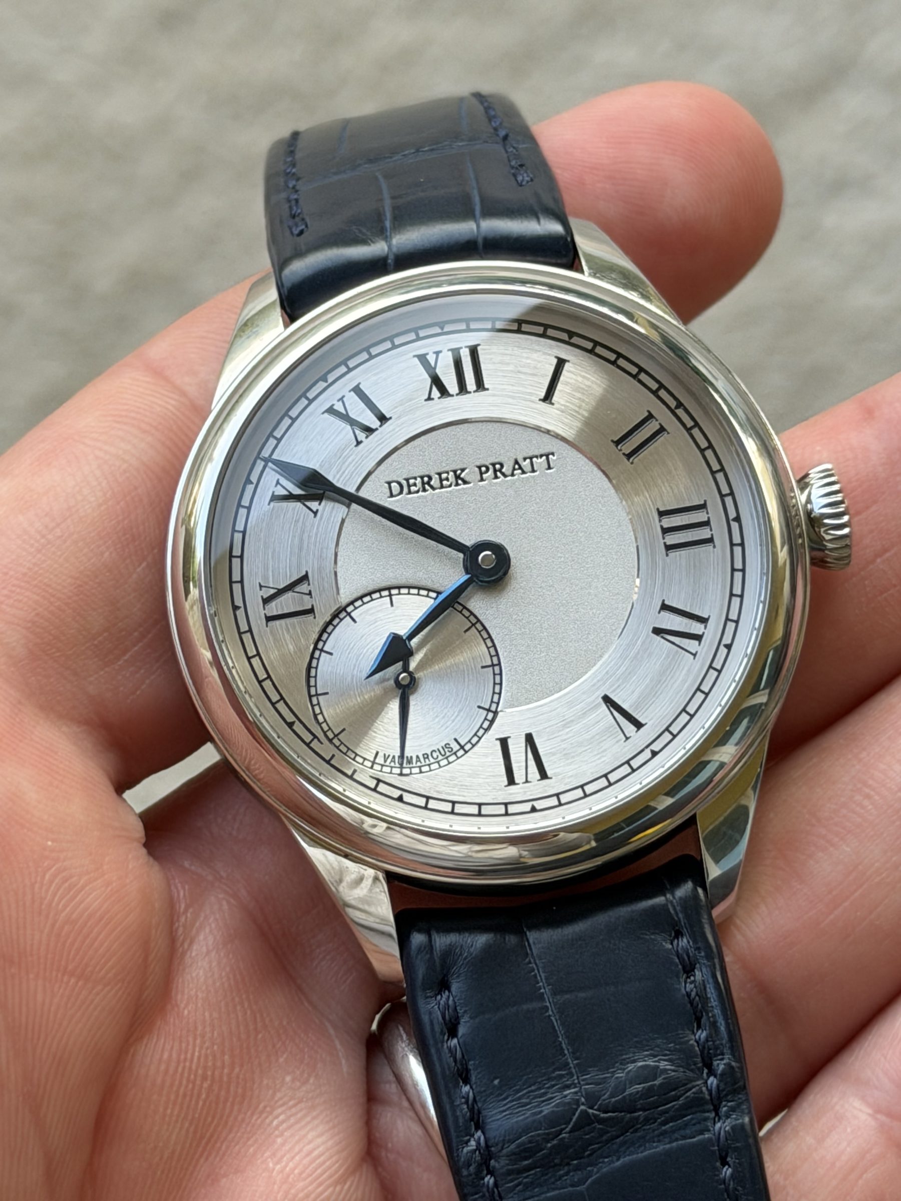 Steel case — silvered Roman dial